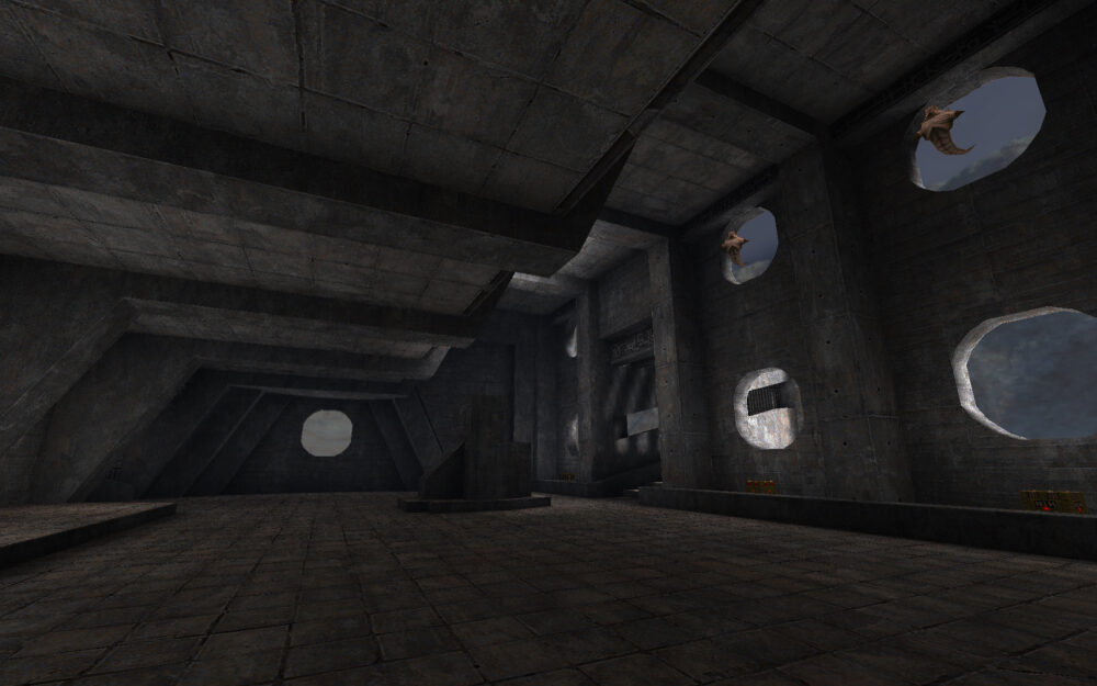 Screenshot from Quake, showing an area with circular windows looking outside to the sky & mountains.